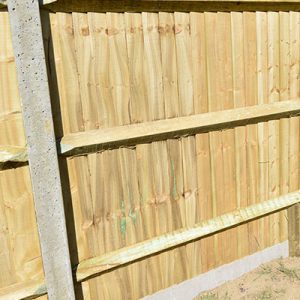 Should you use concrete or wood fence posts?